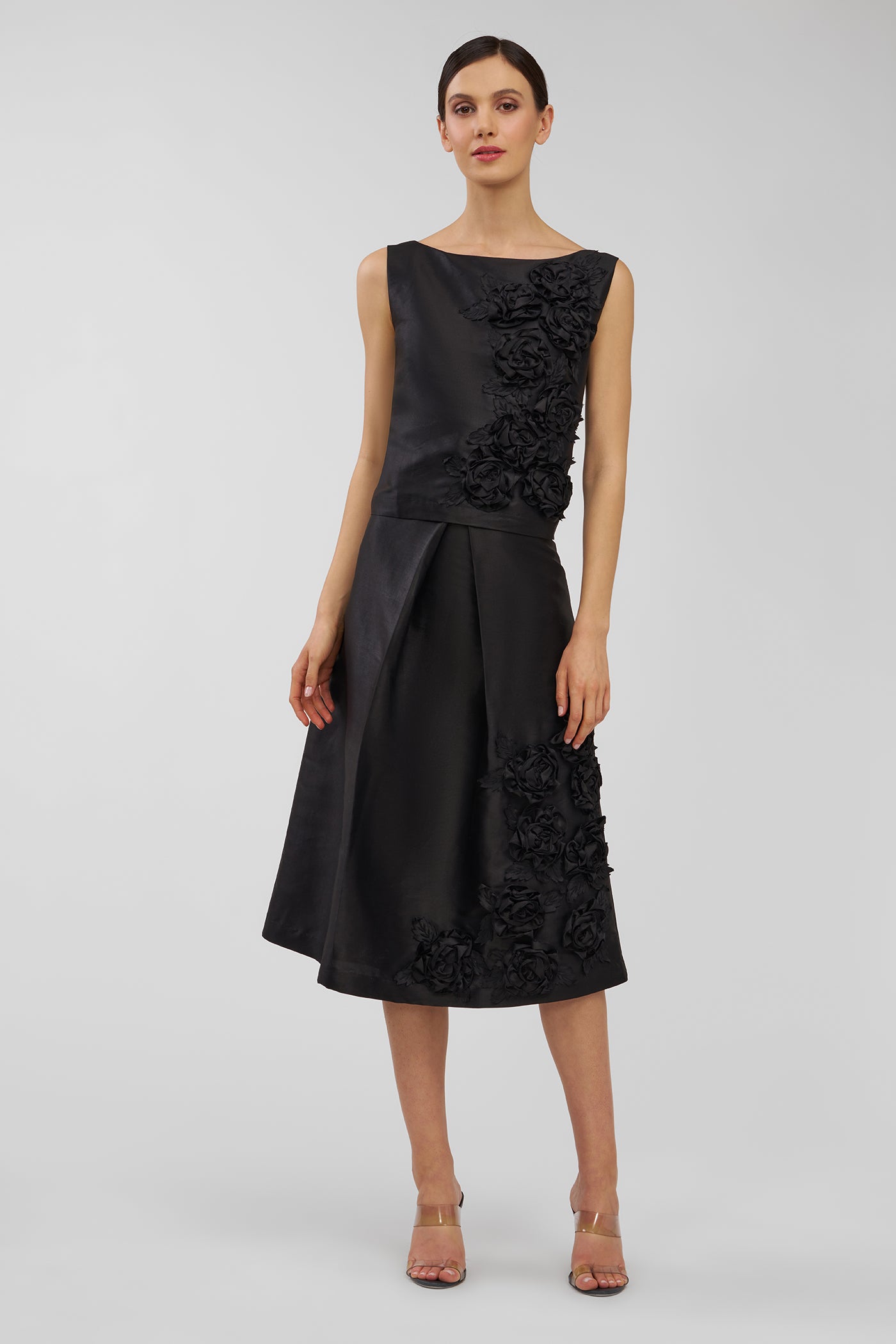 Black skirt with floral details on a white background